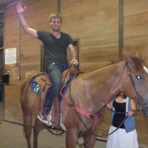 Tom Bourlet riding a horse